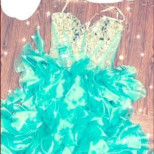 Blue jeweled prom dress